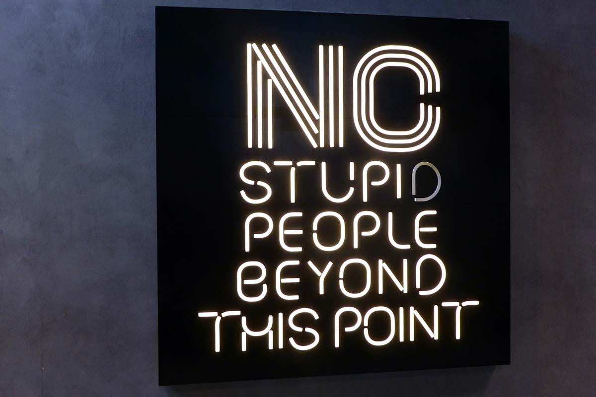 No stupid people sign